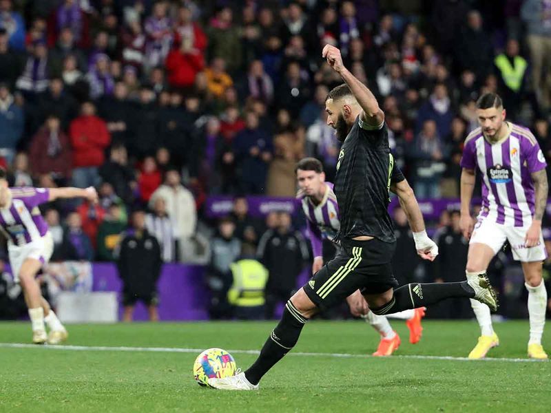 Real Madrid's Karim Benzema scores their first goal from the penalty spot 