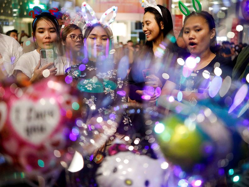 Revelers celebrate New Year's Eve in Kuala Lumpur, Malaysia