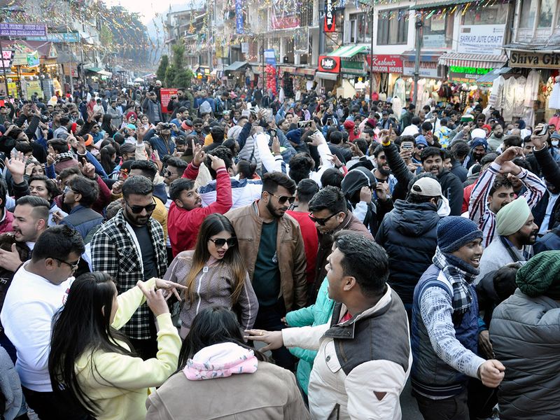 Tourists in large numbers take part in the New Year 2023 celebrations, at Manali, India 