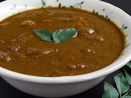 Curry leaves in a tamarind gravy