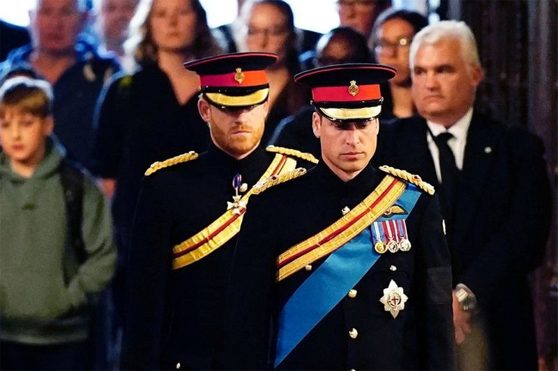 The Prince of Wales (right) and the Duke of Sussex before holding a vigil beside the coffin of their grandmother, Queen Elizabeth II, as it lies in state on the catafalque in Westminster Hall, at the Palace of Westminster, London. Picture date: Saturday September 17, 2022.