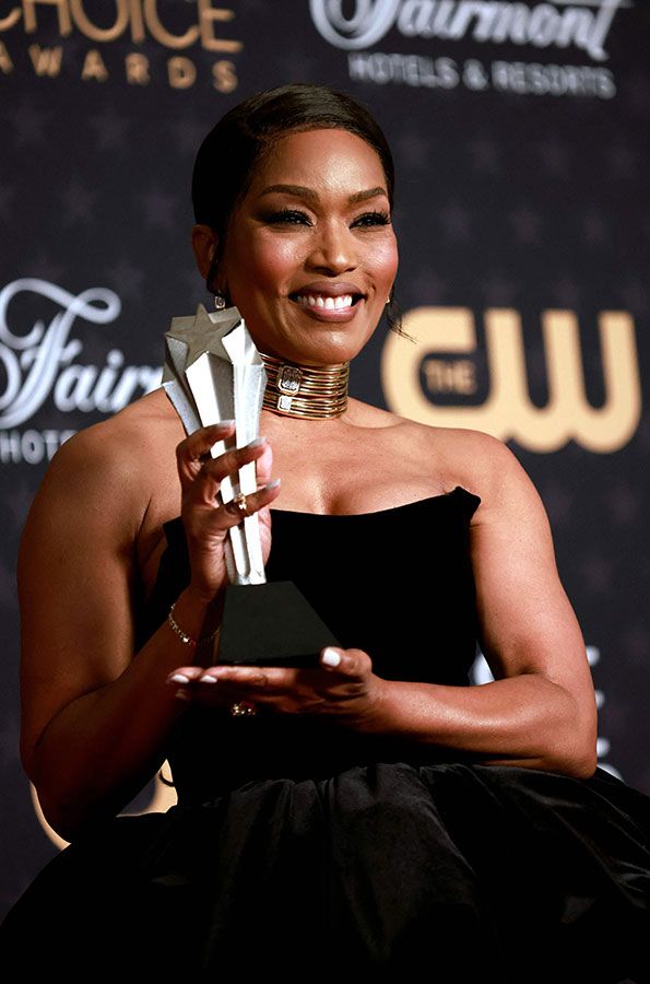 US actress Angela Bassett poses in the press room with the award for Supporting Actress for 