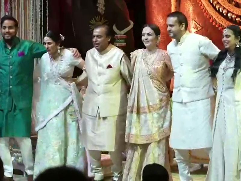 Reliance Industries Chairman and Managing Director Mukesh Ambani, his wife Nita Ambani and other family members perform at the ring ceremony of Anant Ambani and Radhika Merchant, at Antilla residence, in Mumbai on Thursday.
