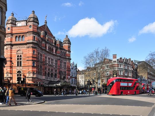 A view of Cambridge Circus with Palace Theatre on left, Charing Cross Road, London.
