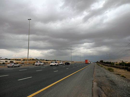 Rain clouds, rain, clouds, rain clouds hover above Emirates road
