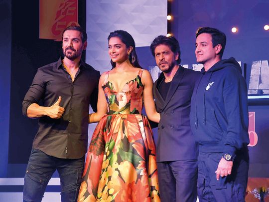 John Abraham, Deepika Padukone, Shah Rukh Khan with their director Siddharth Anand