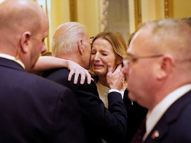 President Joe Biden hugs Brittany Alkonis