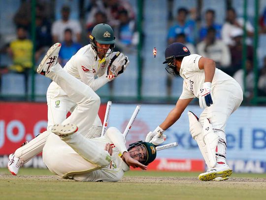 Australia's Alex Carey tries to stump Indian skipper Rohit Sharma during Day 1 of the second test match against India in the Australia tour of India, 2023 at Arun Jaitley Stadium, in New Delhi on Friday.
