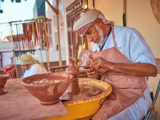 An Emirati potter at Heritage Village