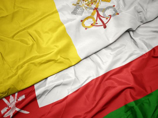 Oman and Vatican flag