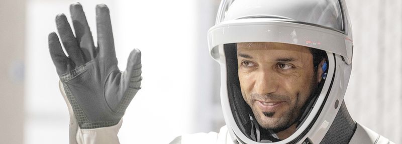 Mission Specialist Sultan Al Neyadi of the UAE, member of the SpaceX Dragon Crew-6 mission, gestures during the crew walkout from the Neil A. Armstrong Operations and Checkout Building for Launch Complex 39A ahead of their expected lift off at NASA's Kennedy Space Center in Cape Canaveral, Florida.  
