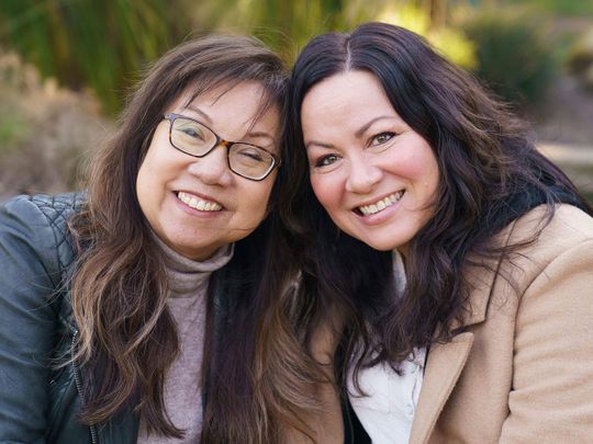 Anna Wong, niece of the late actress Anna May Wong, left, poses with Shannon Lee, daughter of the late martial arts actor Bruce Lee, at Douglas Park in Santa Monica, Calif., on Tuesday, March 7, 2023. They both discovered parallel experiences protecting the legacy of a family member who happens to be a Hollywood and Asian American icon. 