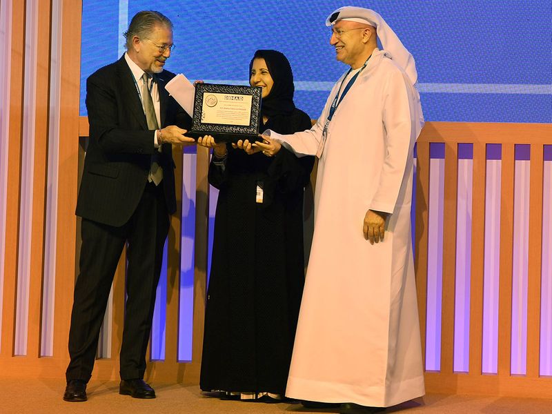 On behalf of Sheikha Fatima, Dr Maitha, who is her advisor, received the award