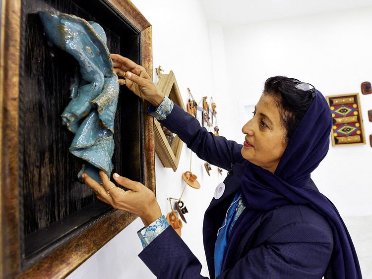 Awatif Al Keneibit shows her art in her studio in Riyadh. 