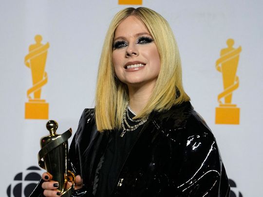Avril Lavigne poses backstage with her award for TikTok Juno Fan Choice as the Canadian Academy of Recording Arts and Sciences (CARAS) presents its 52nd annual Juno Awards in Edmonton, Alberta, Canada March 13, 2023.