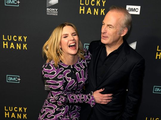 Bob Odenkirk, right, the star and executive producer of the AMC television series 'Lucky Hank', shares a laugh with actor Rhea Seehorn at the premiere of the series on March 15, 2023, at the London Hotel in West Hollywood, California. 