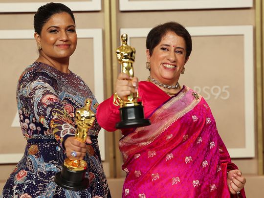 Kartiki Gonsalves and Guneet Monga pose with the Oscar for Best Documentary Short Film for 