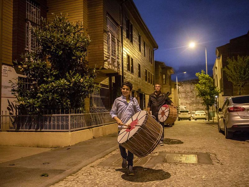 Ramadan Drummer and Eid Drummer walking in Istanbul streets at midnight 30 May 2018 Istanbul - Turkey