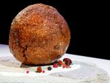 A meatball made from flesh cultivated using the DNA of an extinct woolly mammoth is presented at NEMO Science Museum created by a cultured meat company, in Amsterdam. 