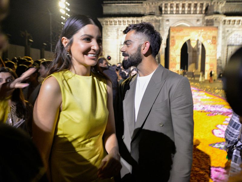 Bollywood actress Anushka Sharma and Indian cricketer Virat Kohli at the Christian Dior Fall 2023 fashion show in Mumbai
