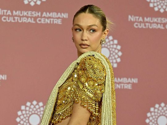 In this picture taken on April 1, 2023, US model Gigi Hadid poses for pictures during the inauguration of the Nita Mukesh Ambani Cultural Centre (NMACC) at the Jio World Centre (JWC) in Mumbai.