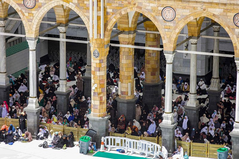 Muslim worshippers pray around the Kaaba  Islam's holiest shrine, at the Grand Mosque in the holy city of Mecca during the second Friday prayers in the holy month of Ramadan on March 31, 2023. 