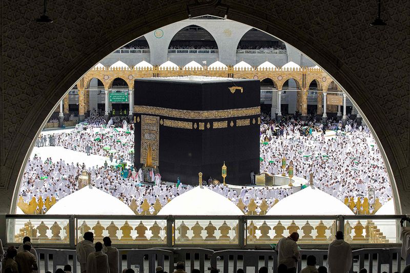 Muslim worshippers pray around the Kaaba, Islam's holiest shrine, at the Grand Mosque. 