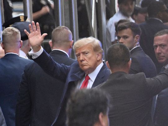 Former US president Donald Trump arrives ahead of his arraignment at the Manhattan Federal Court in New York City on April 4, 2023.  