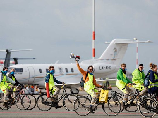 climate activists Amsterdam Schiphol Airport