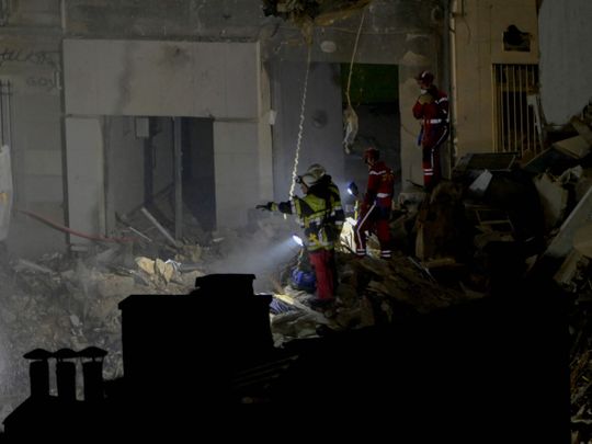 Photos: Two bodies found in French building collapse as rescue efforts ...