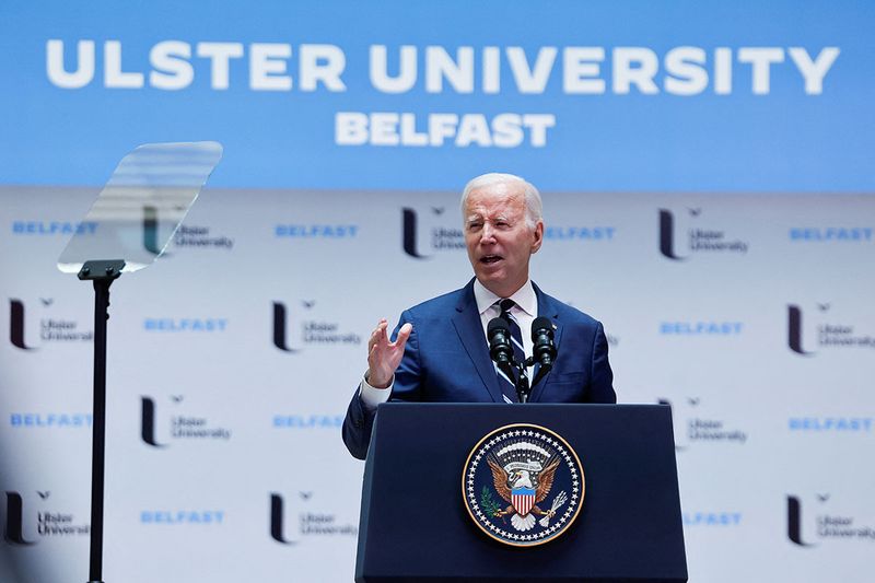 U.S. President Joe Biden delivers remarks marking the 25th anniversary of the Belfast/Good Friday Agreement and underscoring the readiness of the United States to support Northern Ireland's vast economic potential to the benefit of all communities, at Ulster University, Belfast, Northern Ireland, April 12, 2023. REUTERS/Clodagh Kilcoyne