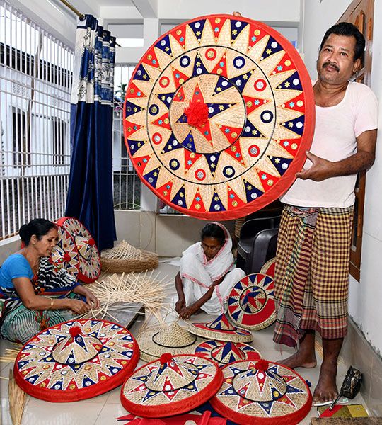  A Craftsmen displays Assamese Traditional “Japi” ahead of the Rongali Bihu festival at Tezpur, in Sonitpur on Wednesday. 