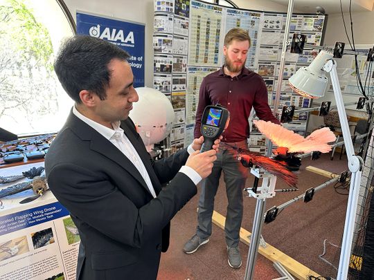 Dr. Mostafa Hassanalian (left), a mechanical engineering professor and Ph.D student, Brenden Herkenhoff, analyse a heat map on a taxidermy bird drone at New Mexico Institute of Mining and Technology in Socorro, New Mexico, US. 