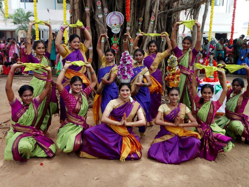 Students wearing traditional attires perform during the Tamil New Year and Vishu celebrations in Chennai.