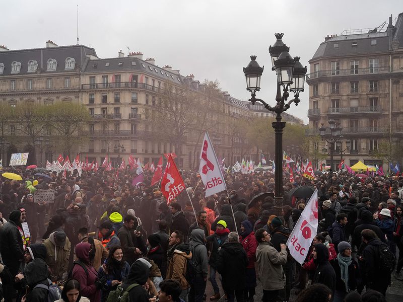 Demonstrators gather outside the Paris town hall, on April 14, 2023 in Paris