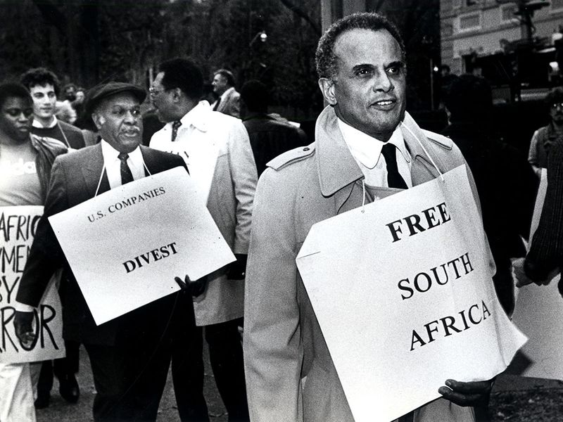 Harry Belafonte demonstrates during the Free South Africa Movement in 1984.