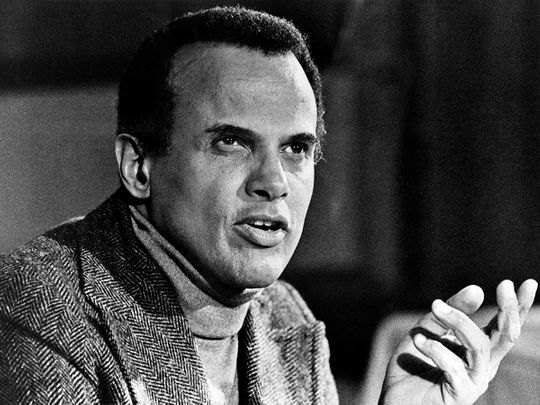 In this file photo taken on October 26, 1976, US singer and civil rights activist Harry Belafonte speaks in Paris. - Belafonte, the superstar entertainer who introduced a Caribbean flair to mainstream US music and became well known for his deep personal investment in civil rights, died Pail 25, 2023, in Manhattan. 