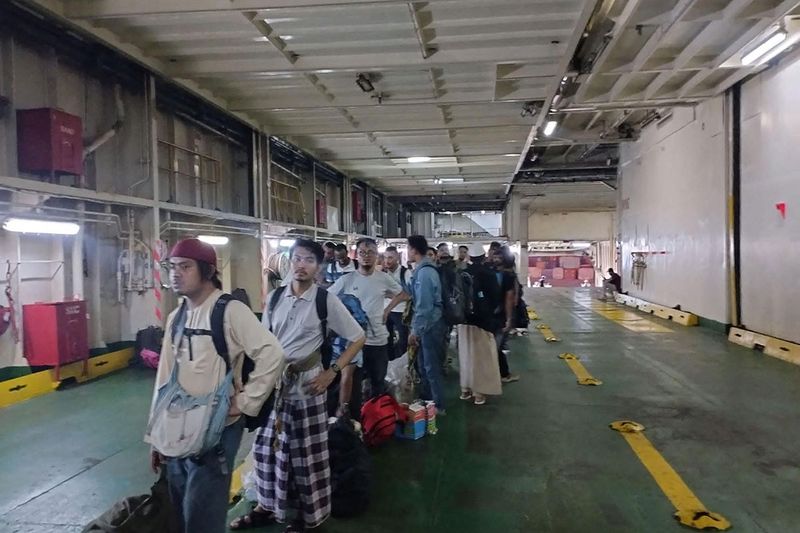 This handout photo taken and released on April 25, 2023 by Thailand's Ministry of Foreign Affairs shows Thai nationals embarking on a ship in Port Sudan, as they are evacuated to Saudi Arabia following an outbreak of fighting between military factions in Sudan.