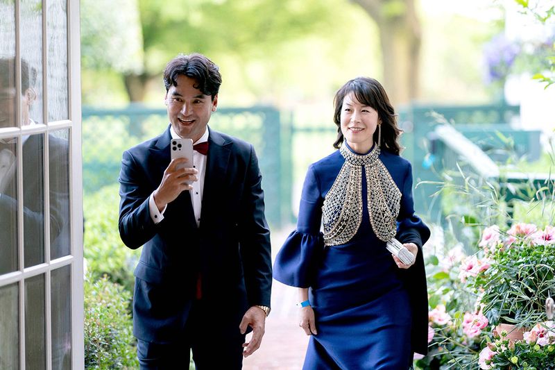 South Korean baseball pitcher Chan Ho Park (L) and Rie Park arrive for a State Dinner with US President Joe Biden and South Korean President Yoon Suk Yeol at the White House in Washington, DC, on April 26, 2023. 