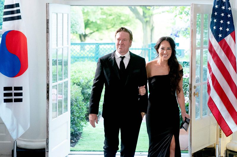 Television personalities Chip Gaines (L) and Joanna Gaines arrive for a State Dinner with US President Joe Biden and South Korean President Yoon Suk Yeol at the White House in Washington, DC, on April 26, 2023.