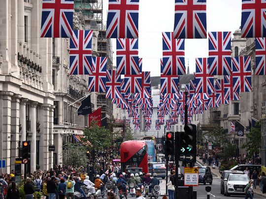 Union Jack flags hang along Regent Street, ahead of the Coronation of King Charles and Camilla, Queen Consort in London, Britain, April 30, 2023.