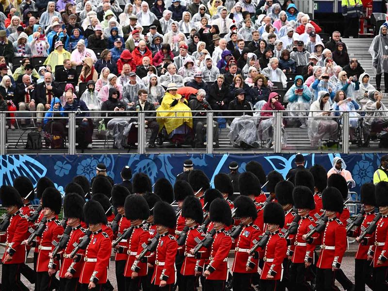 Members of the Coldstream Guards march on the route of the 'King's Procession', a journey of two kilometres from Buckingham Palace to Westminster Abbey in central London on May 6, 2023