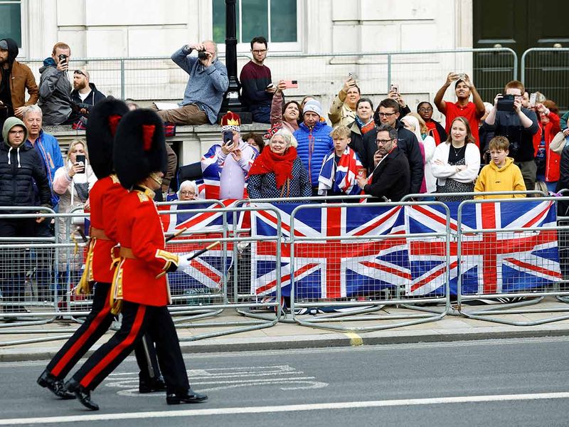 Troops in full military uniform march on the day of Britain's King Charles' coronation ceremony, in Whitehall, in London, Britain May 6, 2023.