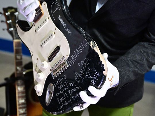 US musician Kurt Cobain's smashed Fender Stratocaster is displayed at Julien's Auctions in Gardena, California