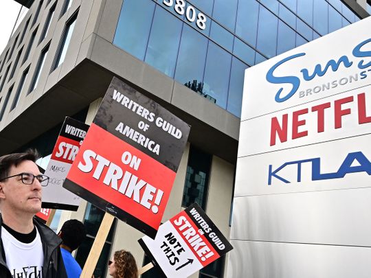 Hollywood writers picket outside Netflix offices in Hollywood, California.