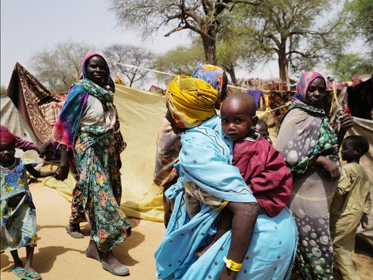 A sudanese woman who fled the conflict in Sudan's Darfur region