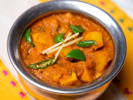 Lahori Aloo or spicy potatoes in tomato gravy 