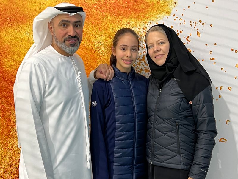 Sara Bin Karam with parents 