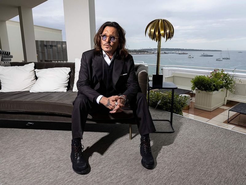 Johnny Depp poses for portrait photographs for the film 'Jeanne du Barry', at the 76th international film festival, Cannes, southern France.