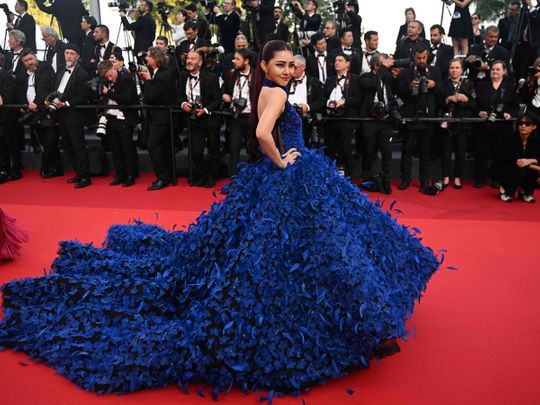 Cambodian actress Yubin Shin wears Dubai designer Michael Cinco's creation at the 76th Cannes Film Festival